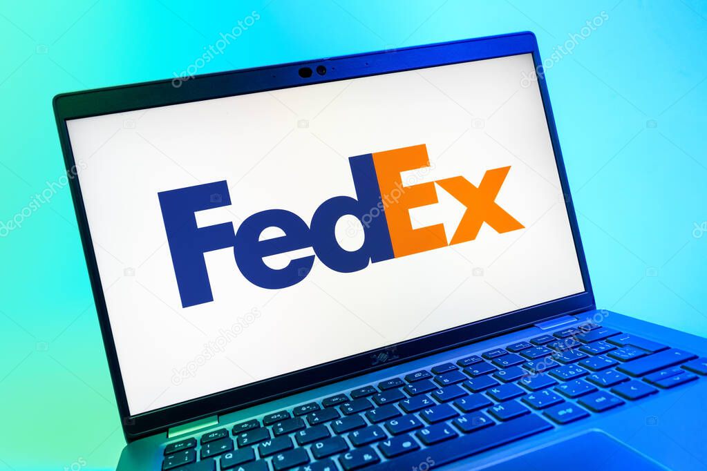 Prague, Czechia - 08 01 2025: A close-up view of a laptop screen displaying the FedEX logo. FedEX is a logistics company providing shipping and courier services.