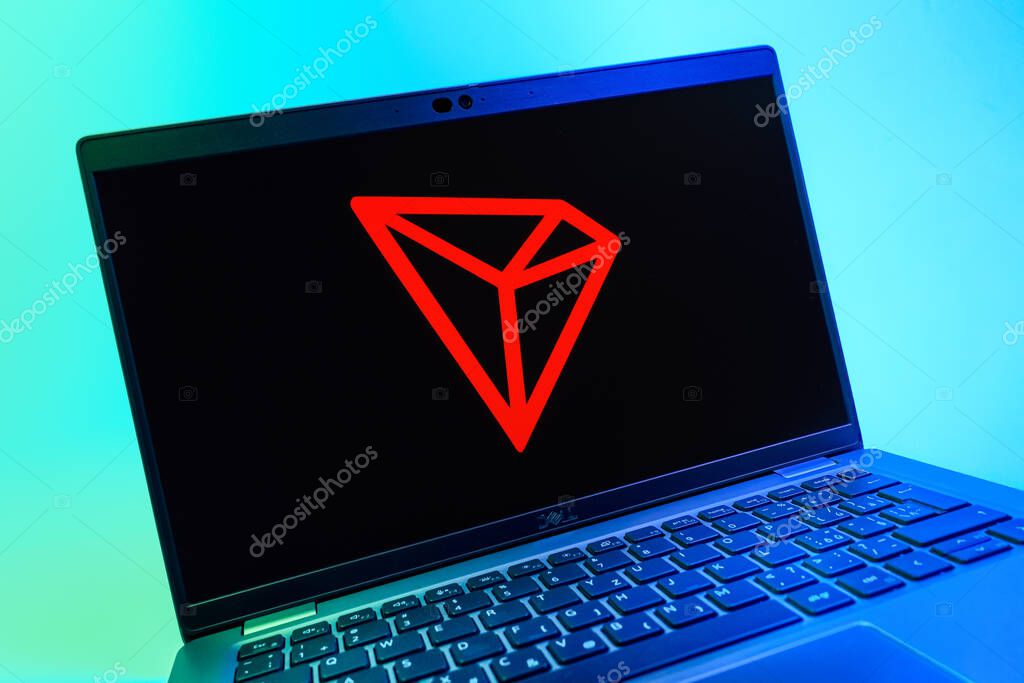 Prague, Czechia - 08 01 2025: A close-up view of a laptop screen displaying the Tron logo. Tron is a blockchain platform for decentralized applications.
