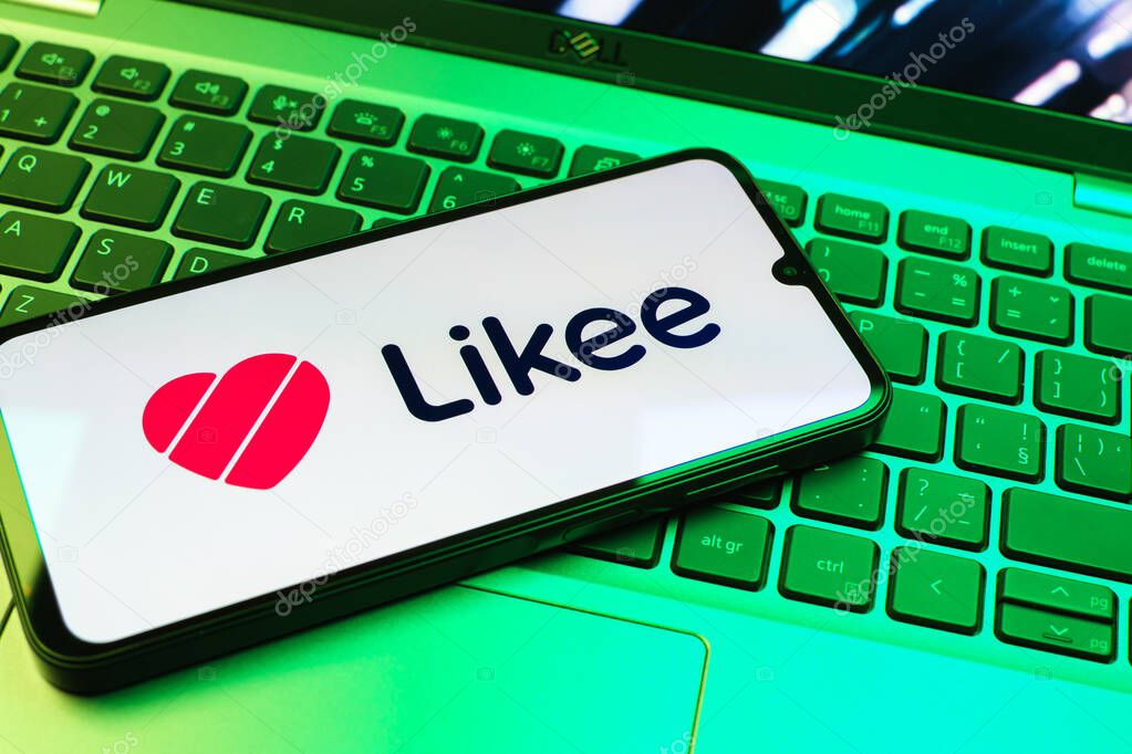 Prague, Czechia - 08 01 2025: A mobile phone lying on a laptop keyboard displays the Likee logo. Likee is a platform for creating and sharing short videos.