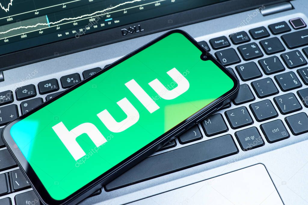 Prague, Czechia - 08 18 2025: A mobile phone on a keyboard displays Hulu logo. Hulu is a streaming platform for TV shows, movies, and live TV.