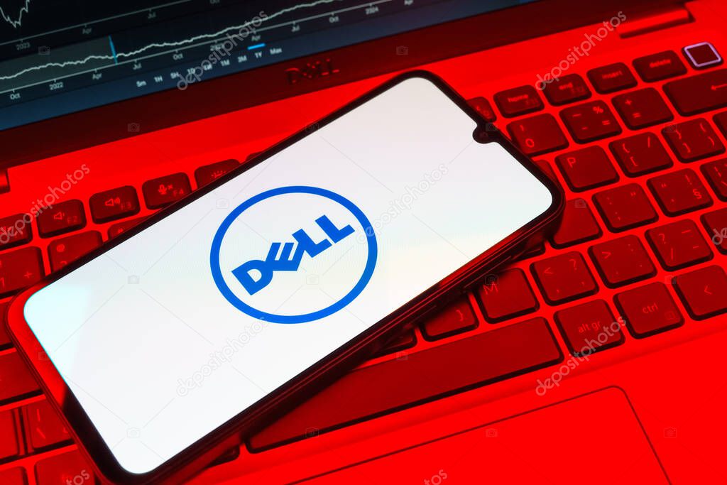 Prague, Czechia - 08 18 2025: A mobile phone on a keyboard displays Dell logo. Dell is a technology company producing computers and IT solutions.