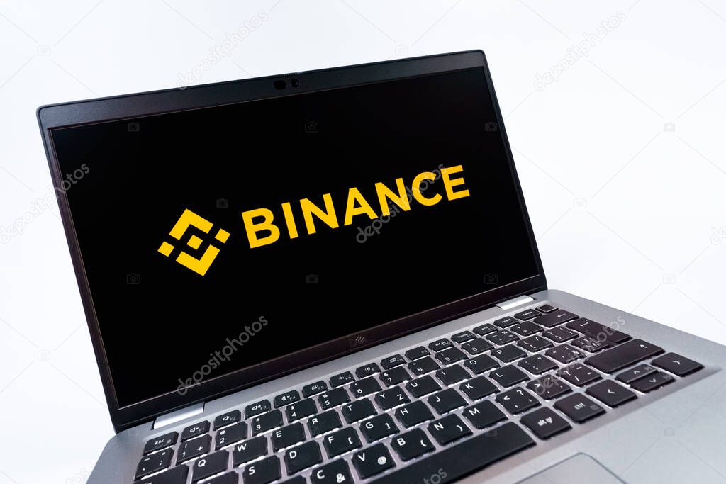 Prague, Czechia - 08 12 2025: A dynamic close-up of a laptop displaying the Binance logo. Binance is a cryptocurrency exchange for trading digital assets.