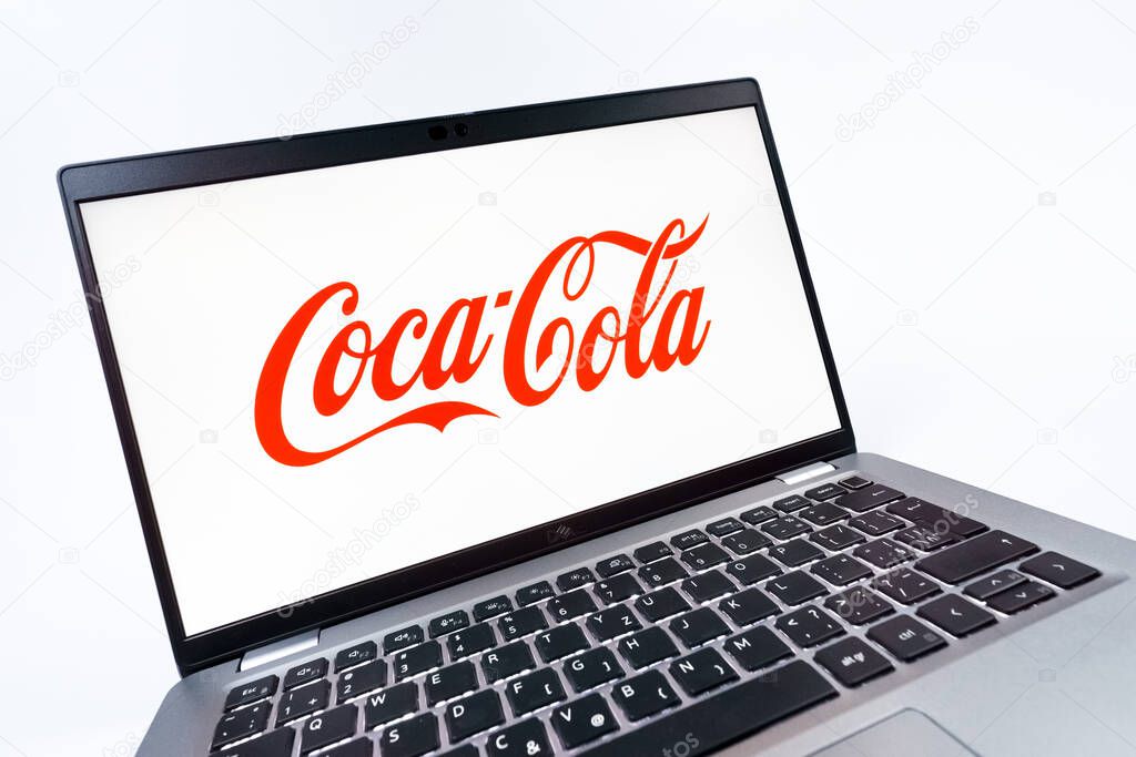 Prague, Czechia - 08 12 2025: A dynamic close-up of a laptop displaying the Coca-Cola logo. Coca-Cola is a beverage company known for its soft drinks.