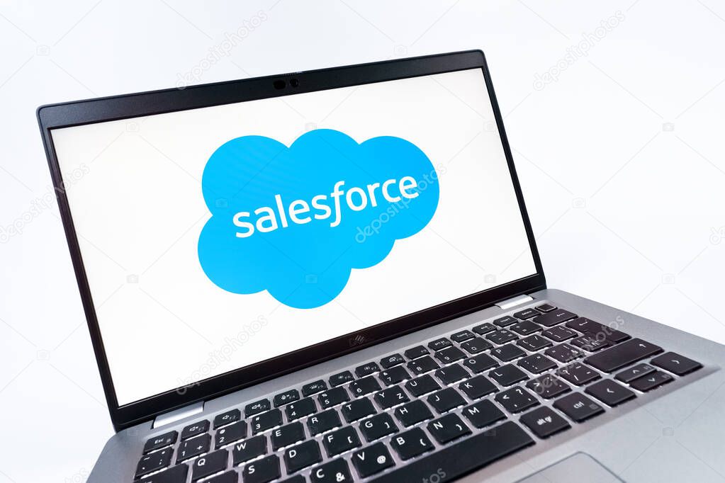 Prague, Czechia - 08 12 2025: A dynamic close-up of a laptop displaying the Salesforce logo. Salesforce is a platform for customer relationship management and cloud services.