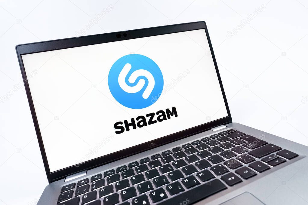 Prague, Czechia - 08 12 2025: A dynamic close-up of a laptop displaying the Shazam logo. Shazam is an app for identifying songs and music tracks.