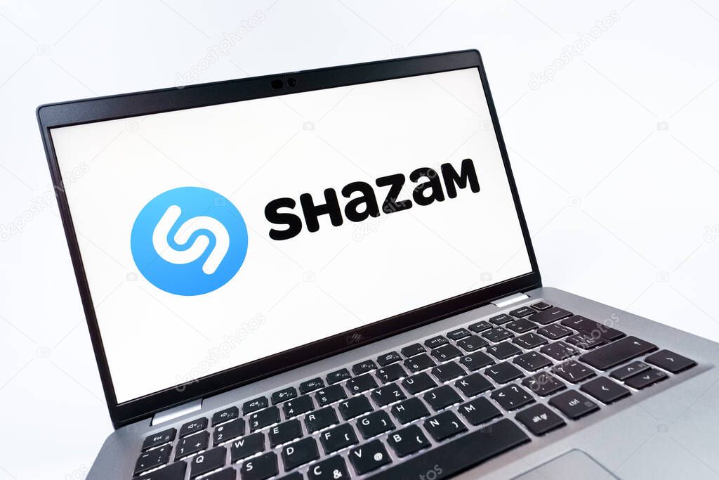 Prague, Czechia - 08 12 2025: A dynamic close-up of a laptop displaying the Shazam logo. Shazam is an app for identifying songs and music tracks.