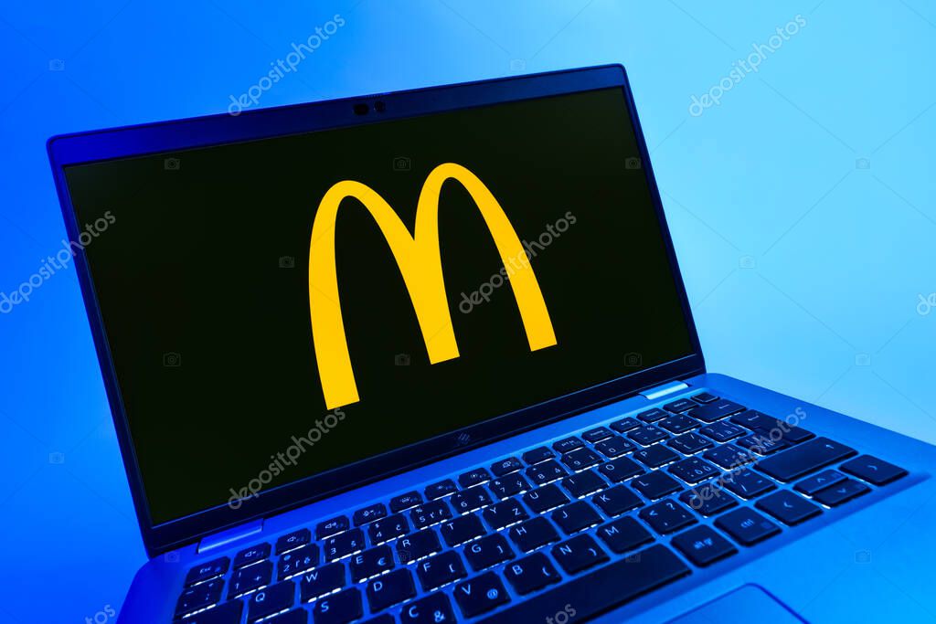 Prague, Czechia - 08 12 2025: A dynamic close-up of a laptop displaying the McDonalds logo. McDonalds is a fast-food chain serving burgers, fries, and more.