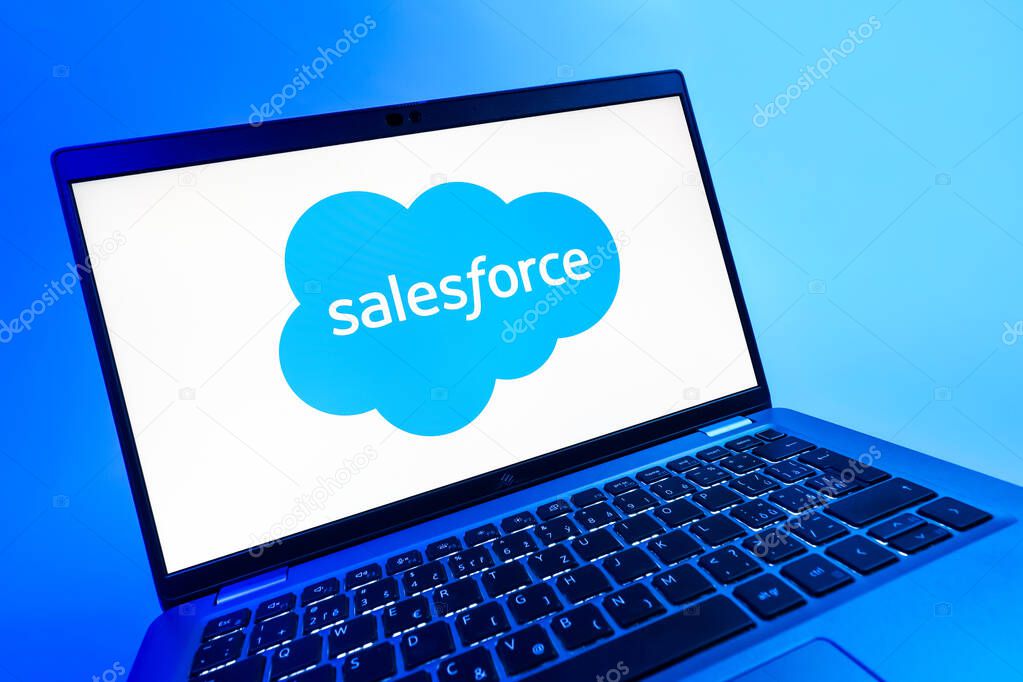 Prague, Czechia - 08 12 2025: A dynamic close-up of a laptop displaying the Salesforce logo. Salesforce is a platform for customer relationship management and cloud services.