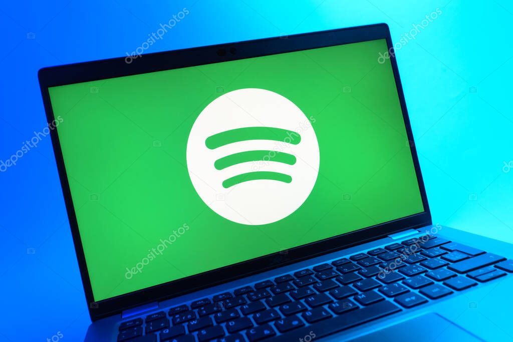 Prague, Czechia - 08 01 2025: A close-up view of a laptop screen displaying the Spotify logo. Spotify is a platform for streaming and discovering music.