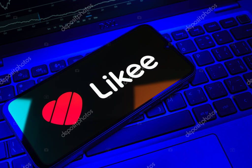 Prague, Czechia - 08 18 2025: A mobile phone on a keyboard displays Likee logo. Likee is a platform for creating and sharing short videos.