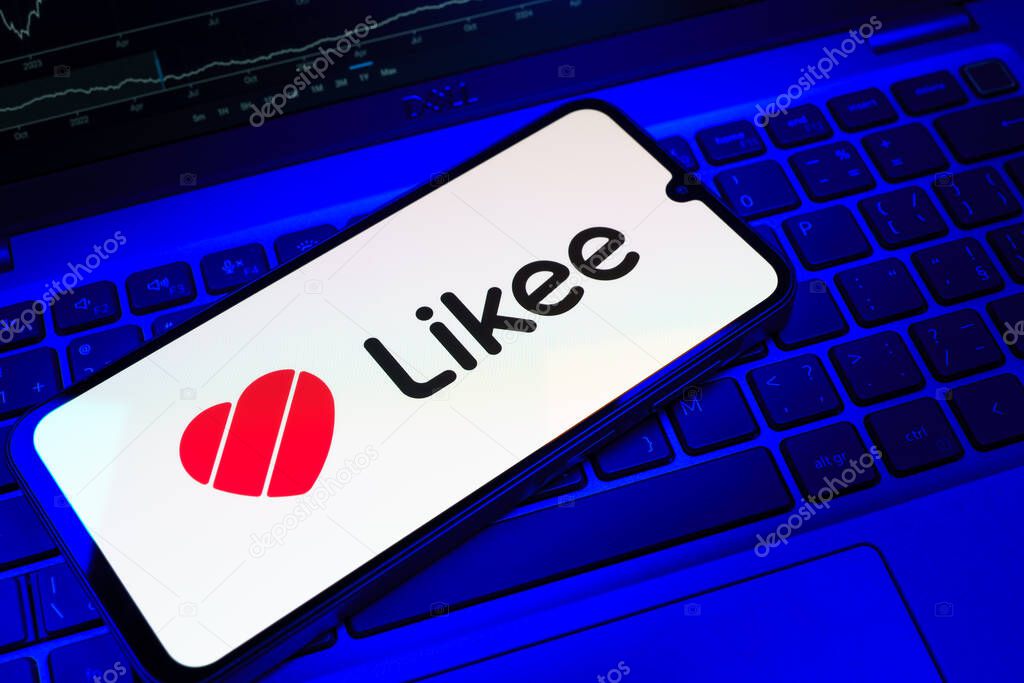 Prague, Czechia - 08 18 2025: A mobile phone on a keyboard displays Likee logo. Likee is a platform for creating and sharing short videos.