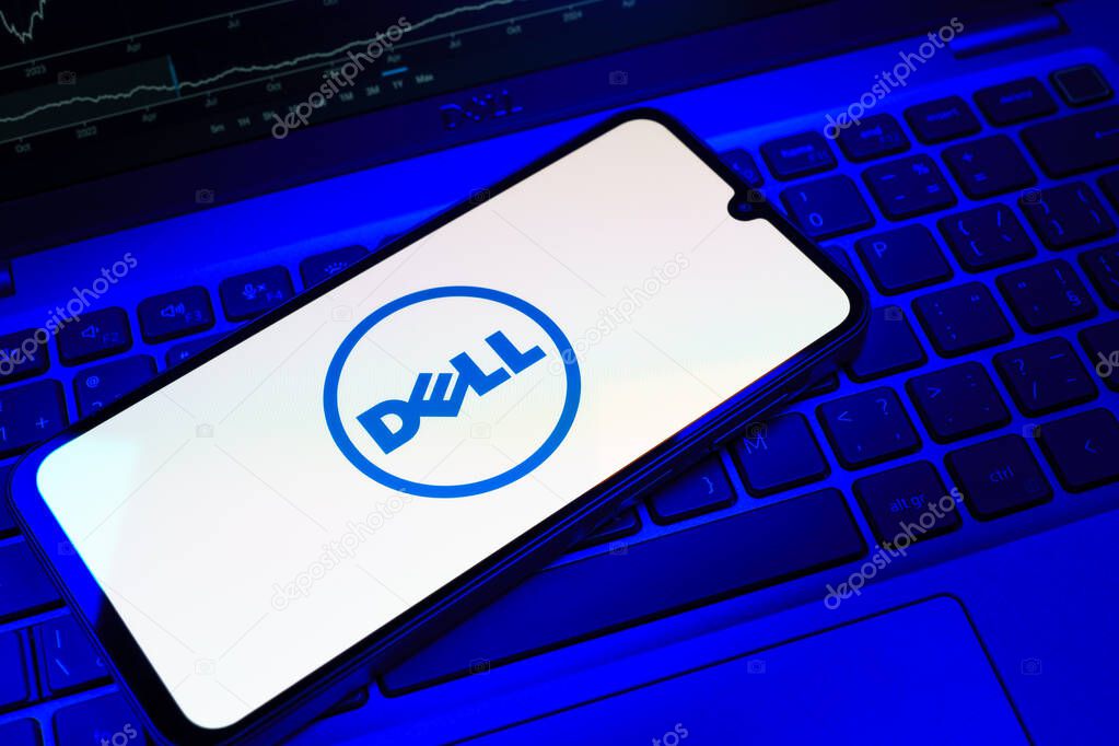 Prague, Czechia - 08 18 2025: A mobile phone on a keyboard displays Dell logo. Dell is a technology company producing computers and IT solutions.