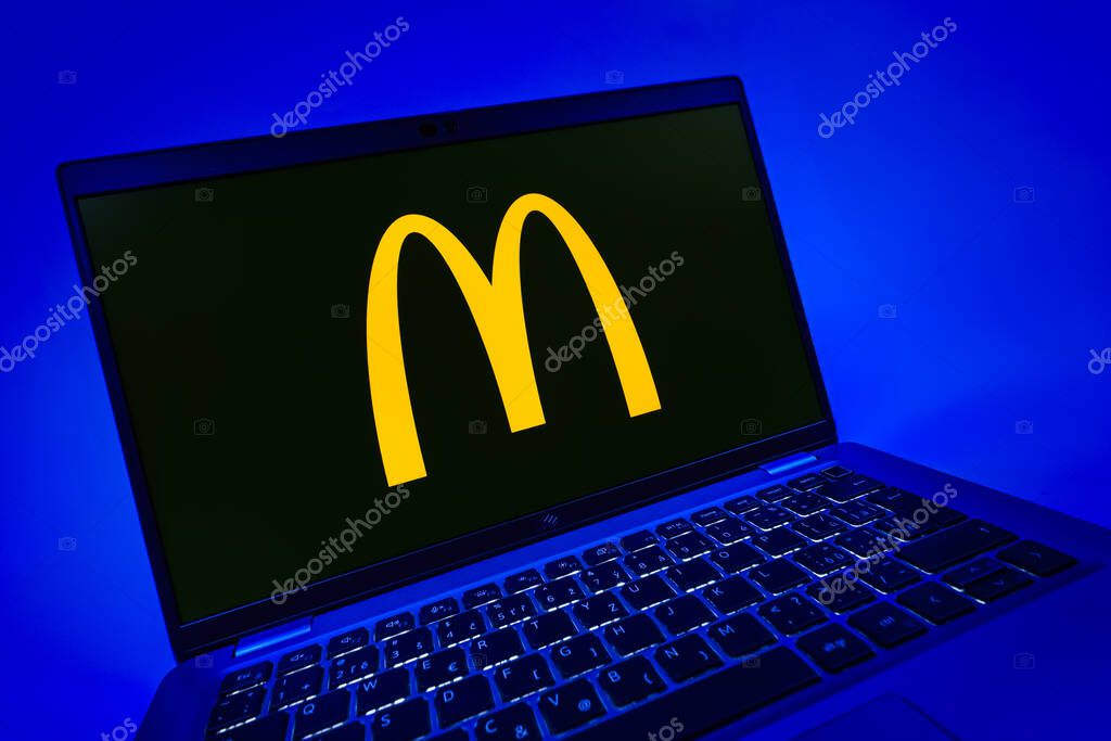 Prague, Czechia - 08 12 2025: A dynamic close-up of a laptop displaying the McDonalds logo. McDonalds is a fast-food chain serving burgers, fries, and more.