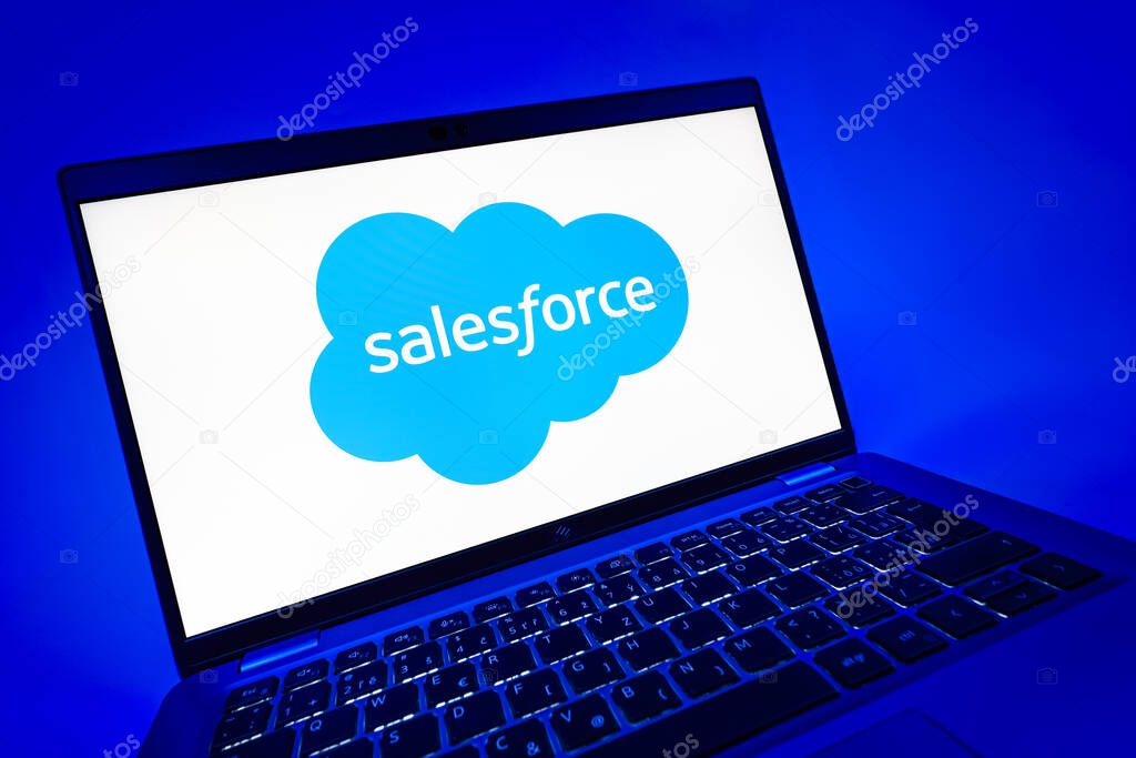 Prague, Czechia - 08 12 2025: A dynamic close-up of a laptop displaying the Salesforce logo. Salesforce is a platform for customer relationship management and cloud services.