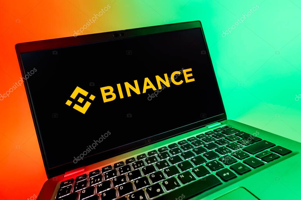 Prague, Czechia - 08 12 2025: A dynamic close-up of a laptop displaying the Binance logo. Binance is a cryptocurrency exchange for trading digital assets.