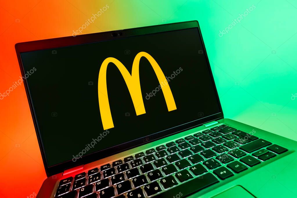 Prague, Czechia - 08 12 2025: A dynamic close-up of a laptop displaying the McDonalds logo. McDonalds is a fast-food chain serving burgers, fries, and more.