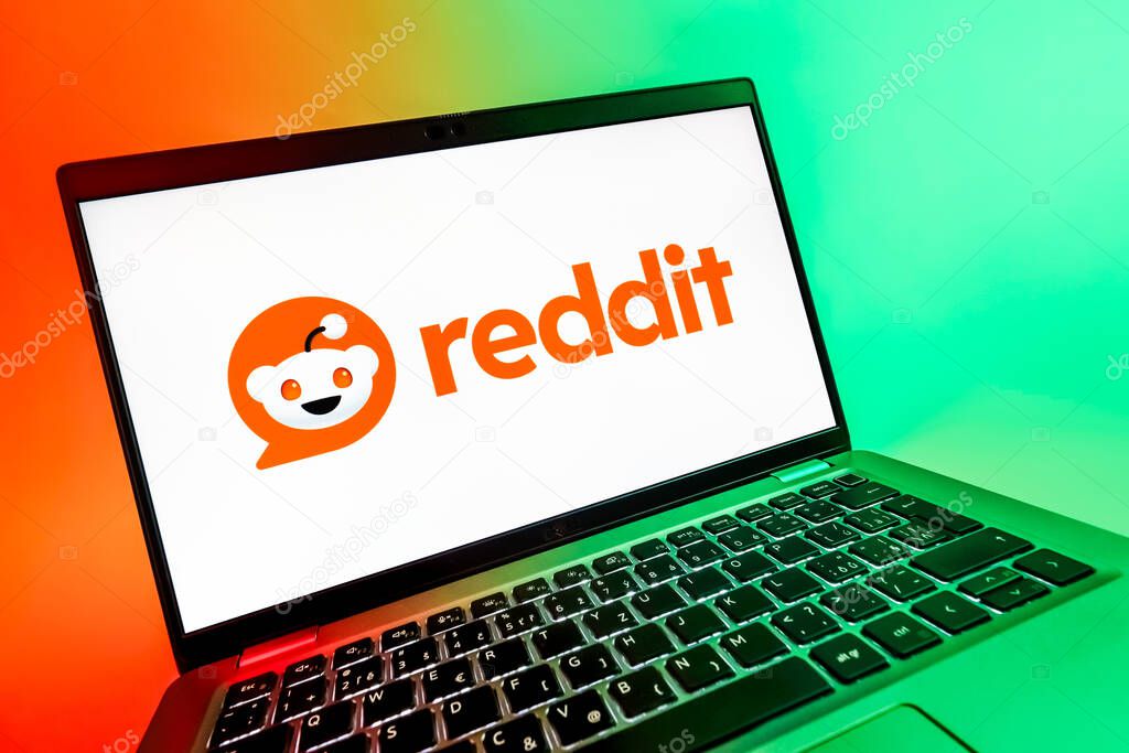 Prague, Czechia - 08 12 2025: A dynamic close-up of a laptop displaying the Reddit logo. Reddit is a platform for discussion, news, and community content.