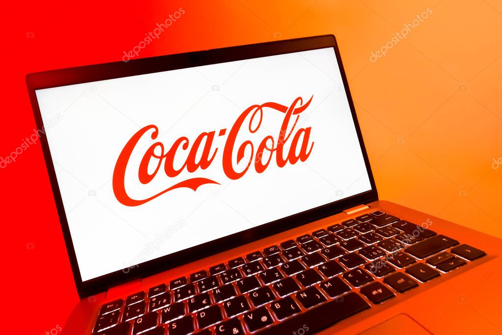 Prague, Czechia - 08 12 2025: A dynamic close-up of a laptop displaying the Coca-Cola logo. Coca-Cola is a beverage company known for its soft drinks.