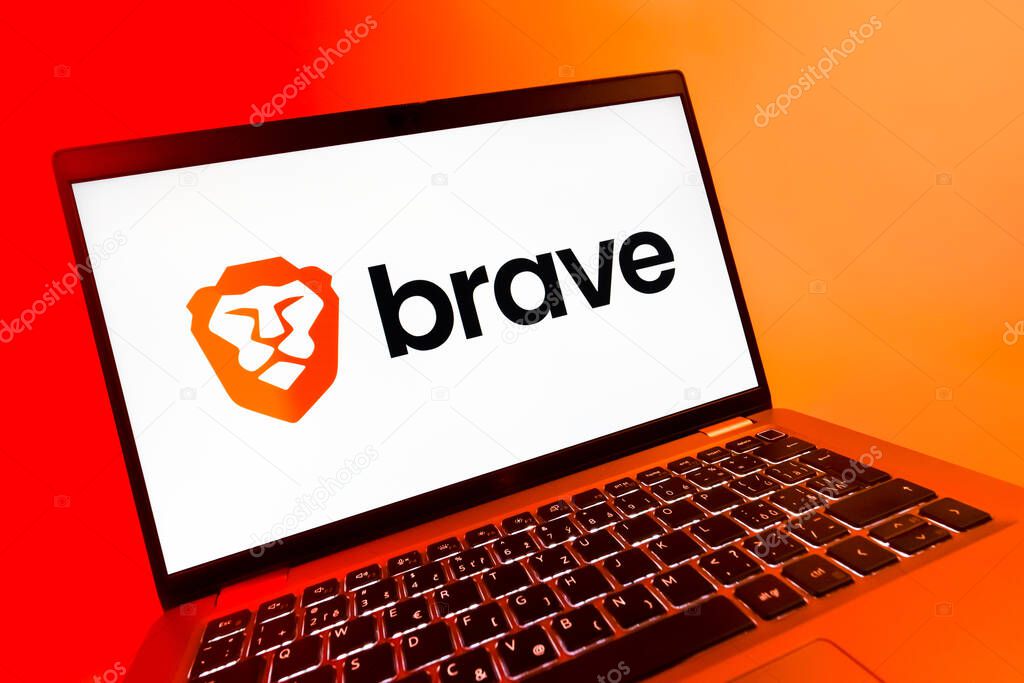 Prague, Czechia - 08 12 2025: A dynamic close-up of a laptop displaying the Brave logo. Brave is a web browser focused on privacy and speed.