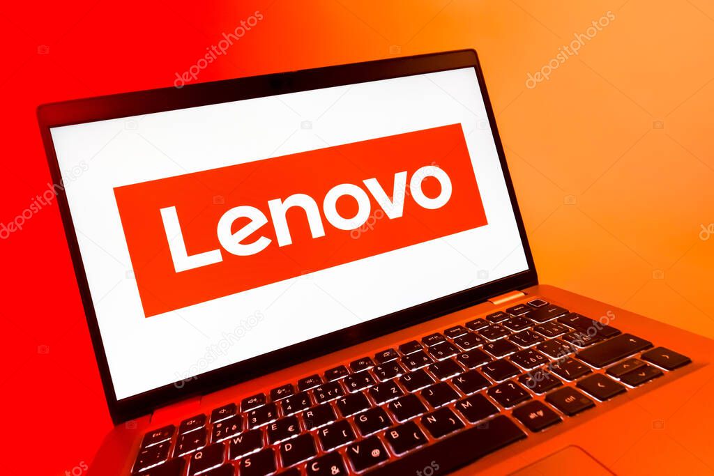 Prague, Czechia - 08 12 2025: A dynamic close-up of a laptop displaying the Lenovo logo. Lenovo is a technology company producing computers and electronics.