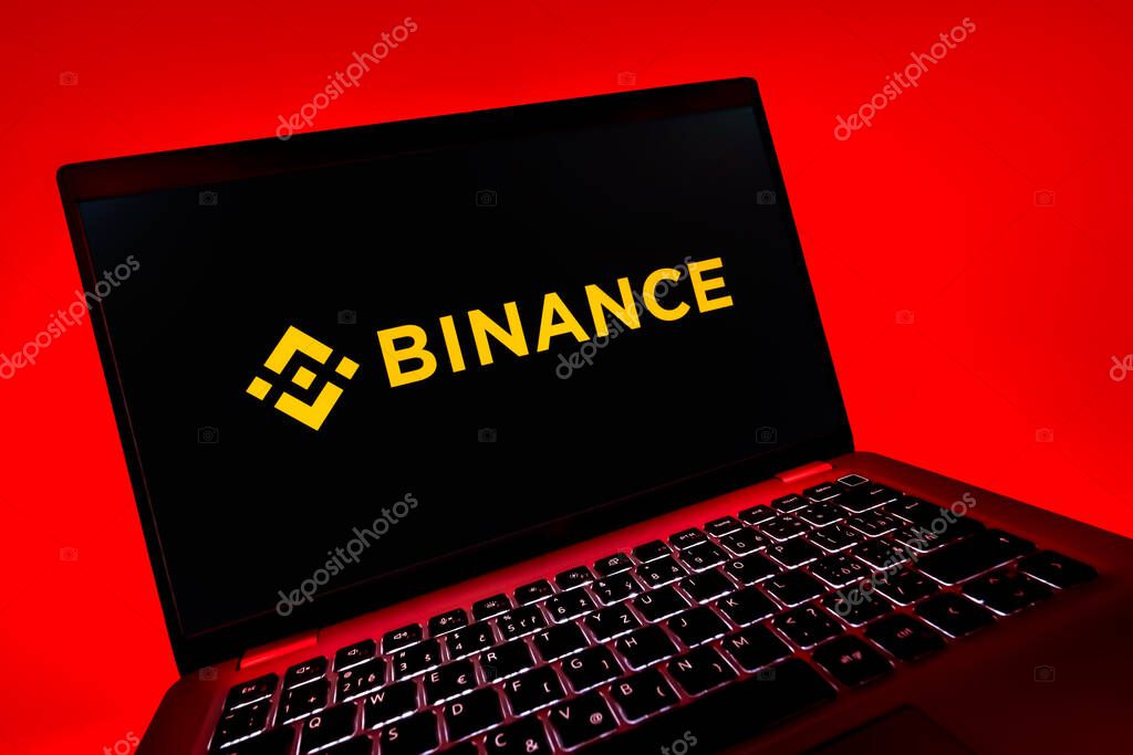 Prague, Czechia - 08 12 2025: A dynamic close-up of a laptop displaying the Binance logo. Binance is a cryptocurrency exchange for trading digital assets.
