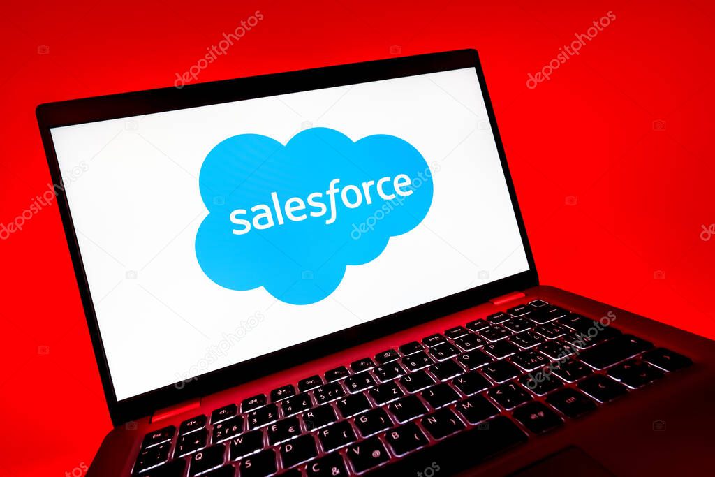 Prague, Czechia - 08 12 2025: A dynamic close-up of a laptop displaying the Salesforce logo. Salesforce is a platform for customer relationship management and cloud services.