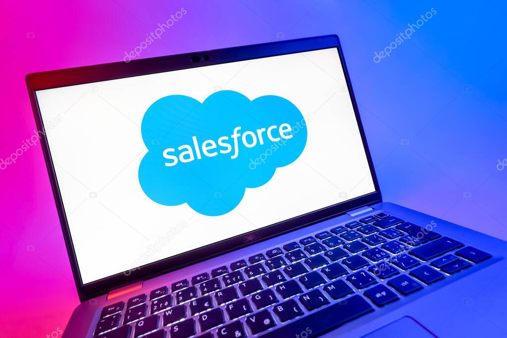 Prague, Czechia - 08 12 2025: A dynamic close-up of a laptop displaying the Salesforce logo. Salesforce is a platform for customer relationship management and cloud services.
