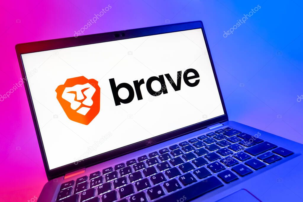 Prague, Czechia - 08 12 2025: A dynamic close-up of a laptop displaying the Brave logo. Brave is a web browser focused on privacy and speed.