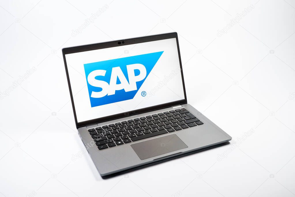 Prague, Czechia - 08 12 2025: A top-down view of a laptop on a uniform background displaying the SAP logo. SAP is a software company providing enterprise applications and solutions.
