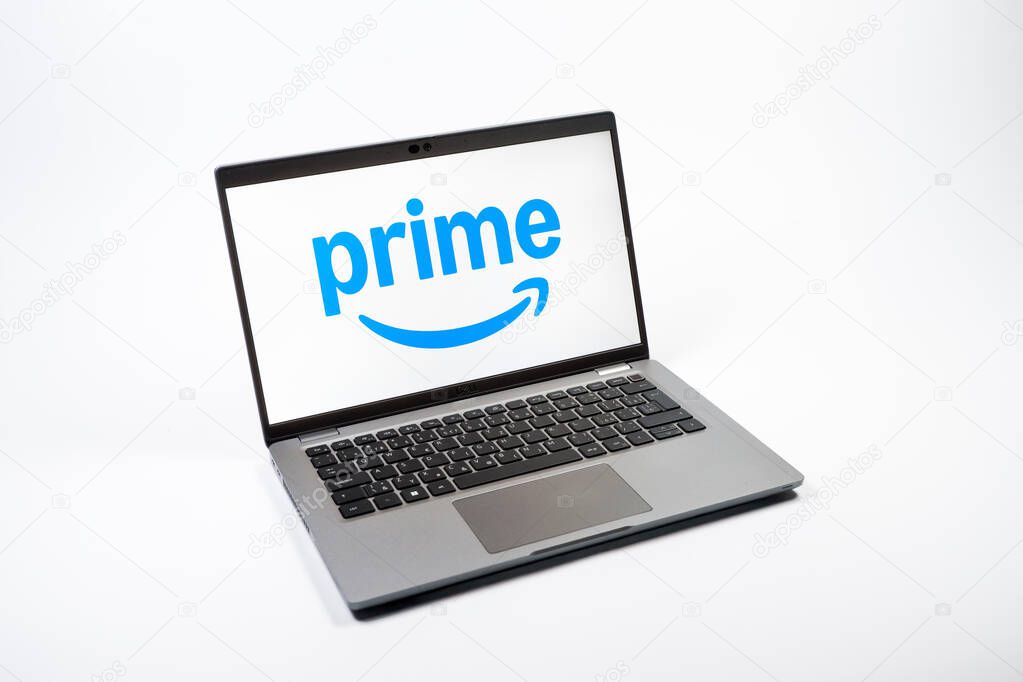 Prague, Czechia - 08 12 2025: A top-down view of a laptop on a uniform background displaying the Prime logo. Prime is a subscription service for shopping, streaming, and benefits.