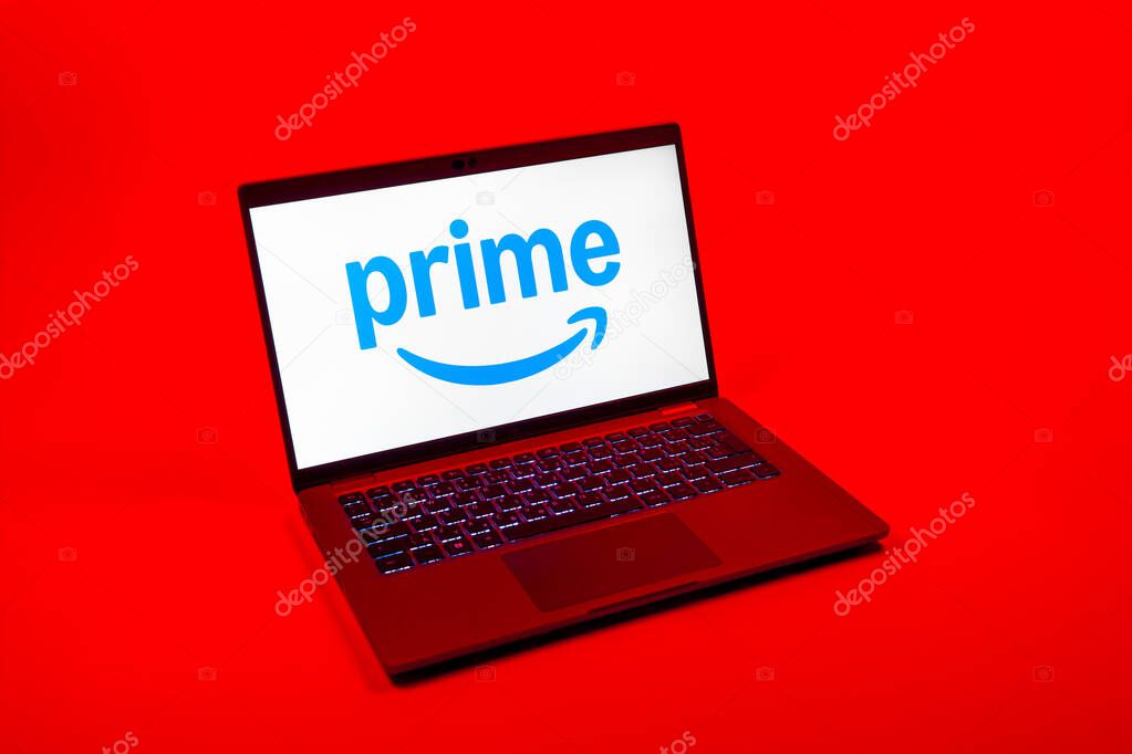 Prague, Czechia - 08 12 2025: A top-down view of a laptop on a uniform background displaying the Prime logo. Prime is a subscription service for shopping, streaming, and benefits.