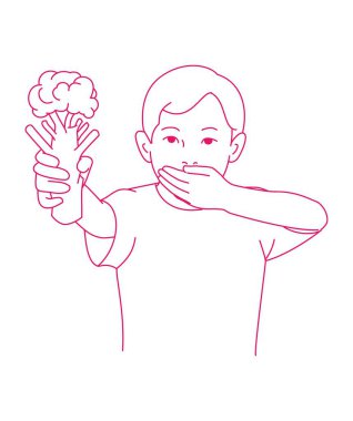 Yeşil gömlekli genç bir çocuk, sebzelerden hoşlanmayan burnunu sıkarken bir parça brokoli tutuyor.