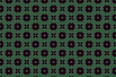 Çarpıcı bir siyah ve yeşil desen. Çiçek patlamaları ve hilal elementleri ritmik, çapraz düzende sıralanmış..
