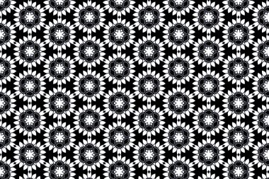 Hassas beyaz çiçekler koyu siyah taneli dokulardan çıkar.