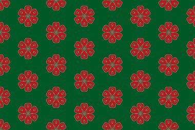 Yeşil yüzeyde pürüzsüz kırmızı çiçek deseni