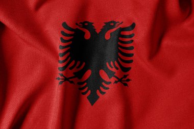 Dokulu Kumaş Arkaplanı Ulusal Bayrağı. İpek desenli bayrak, gerçekçi dalga ve bayrak görünümü. Arnavutluk 'un AL Bayrağı