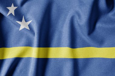 Dokulu Kumaş Arkaplanı Ulusal Bayrağı. İpek desenli bayrak, gerçekçi dalga ve bayrak görünümü. Curaao CW Bayrağı.