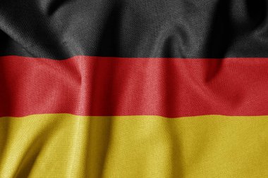 Dokulu Kumaş Arkaplanı Ulusal Bayrağı. İpek desenli bayrak, gerçekçi dalga ve bayrak görünümü. Almanya Bayrağı
