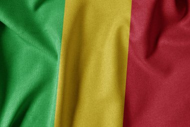 Dokulu Kumaş Arkaplanı Ulusal Bayrağı. İpek desenli bayrak, gerçekçi dalga ve bayrak görünümü. ML Mali Bayrağı