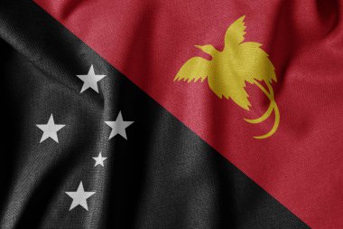 Dokulu Kumaş Arkaplanı Ulusal Bayrağı. İpek desenli bayrak, gerçekçi dalga ve bayrak görünümü. Papua Yeni Gine 'nin PG Bayrağı