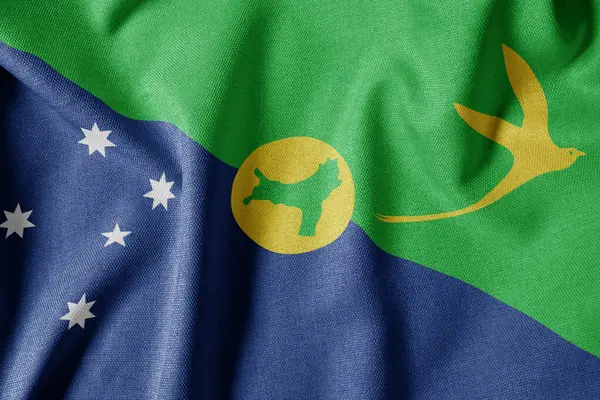 Dokulu Kumaş Arkaplanı Ulusal Bayrağı. İpek desenli bayrak, gerçekçi dalga ve bayrak görünümü. Noel Adasının CX Bayrağı