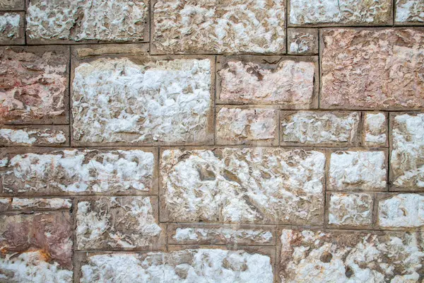 Aydınlık ve Tarafsız Tonları olan Dokulu Taş Duvarın Yakın Çekimi