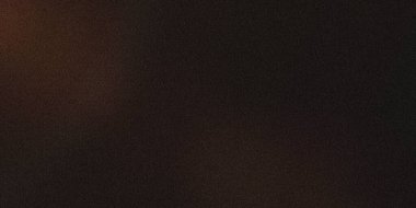 İnce tanecikli, desenli kahverengi bir yüzeye yakın çekim. Açık kahverengiden daha koyu bir gölgeye geçiş. Görüntü pürüzlü ve yıpranmış..