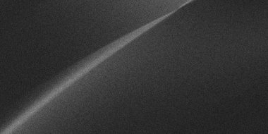 Çapraz beyaz ışık çizgisi kumlu, koyu gri arkaplanı kesiyor. Görüntü ince bir eğilim ve minimalist estetik ile desenli bir görünüme sahiptir..