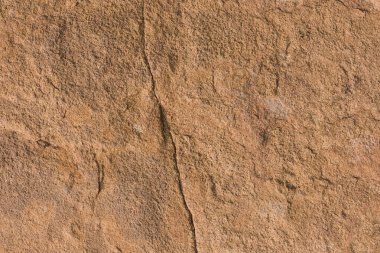 Taş 'ın pürüzlü yüzeyi. Sanat tasarımı için arkaplan ve doku