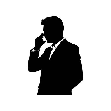 Bir iş adamının silueti, parmakları yüzüne yakın hareketler düşünüyor..