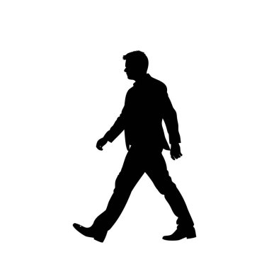 Bir adamın silueti, takım elbise içinde güvenle yürüyor.