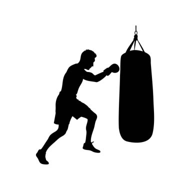 Kararlı bir boksörün silueti kum torbasıyla sıkı çalışıyor.