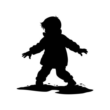 Su birikintisindeki küçük bir çocuk bu görüntüde bir siluet oluşturur.