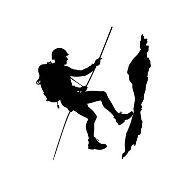 Bir kaya tırmanıcısının silueti kayalıklardan güvenli bir şekilde iniyor.